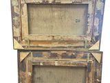 an old wooden easel with a painting on top of it