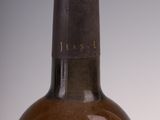 a bottle of wine that is sitting on a table