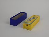 a blue box and a yellow box on a white surface