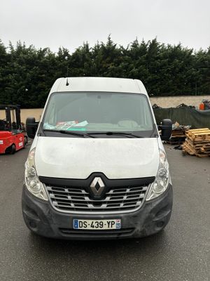 a white van that is parked in a parking lot