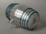 a glass jar with a blue ribbon around it