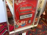 a picture of a picture of a bowling game in a glass case