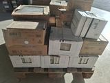 many boxes stacked on top of each other on a pallet