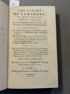 a book open on a table with writing on it