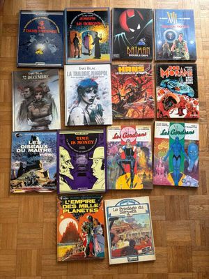 a lot of comic books on the floor on the floor