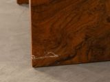 a close up of a piece of wood on the floor
