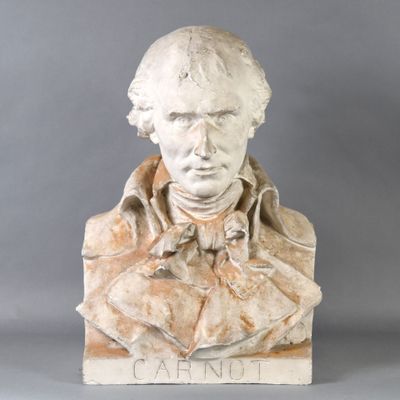 statue of a bust of a man with a bow tie on a gray background