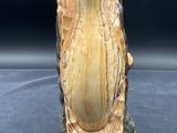 an image of a vase made out of a piece of wood
