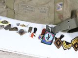 a lot of military items that are on a table