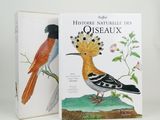 two books with illustrations of birds sitting on top of each other