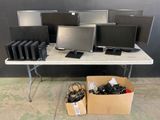 a lot of computers that are on a table
