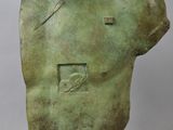 bronze bust of a man with a bird on his shoulder