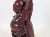 an image of a statue of a man holding his hands up