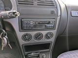 a car dashboard with a bunch of keys in it