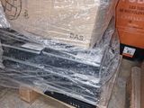 a stack of boxes sitting on a pallet in a warehouse