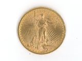 an image of a gold coin on a white surface