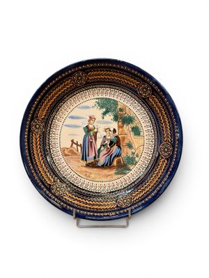 une image représentant une assiette sur laquelle figurent un homme et une femme