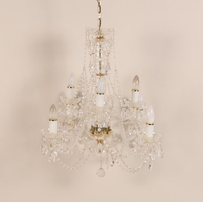 an image of a chandelier hanging from a ceiling in a room