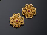pair of gold and ruby earrings