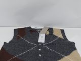 the vest is made of wool and has a brown, beige, and black argyle pattern
