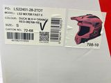 a box with a motorcycle helmet on top of it