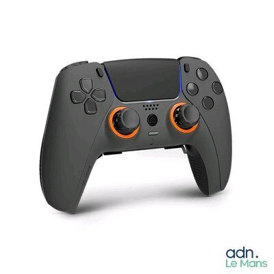 a close up of a game controller on a white surface