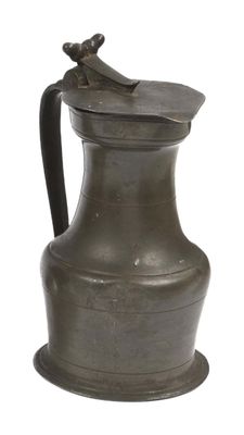 an old metal pitcher with a handle on a white background