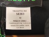 the label on the back of a black jacket that says tricotto