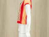 an image of a mannequin wearing a red and yellow top and pants
