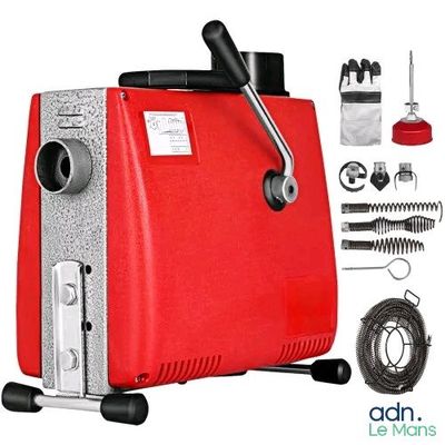 une machine rouge posée sur une surface blanche