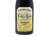 a bottle of wine that is sitting on a table
