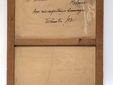 an old picture of a wooden frame with writing on it