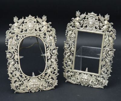 pair of antique silver picture frames with flowers and leaves