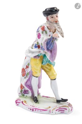 une image représentant une figurine d'un homme avec un oiseau sur l'épaule