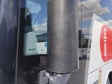 a bus that is parked on the side of the road