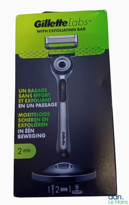 packaging of a razor on a white background with a black background