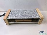 a granite top on top of a toaster oven