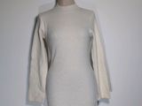 an image of a white sweater dress on a mannequin stand