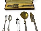 a silverware set in a case with a spoon and fork
