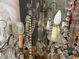 a lot of crystal chandeliers that are on the table