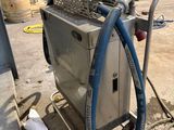 a machine that has a hose attached to it