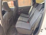a car that has two seats in the back of it