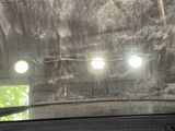 a view of a car ' s windshield from inside the vehicle