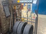 a rack with tires on it in a garage