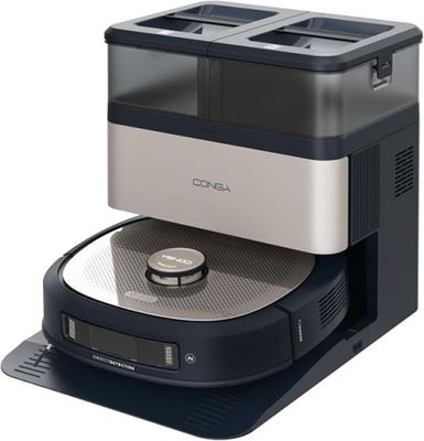 an image of a black and silver coffee maker sitting on top of a table
