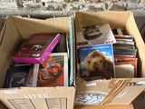 a box full of dvds sitting on top of a table