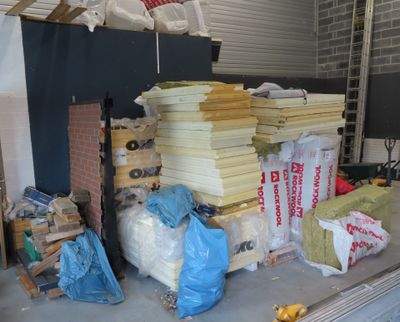 a pile of construction materials sitting on a table