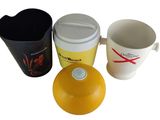 three different types of coffee mugs sitting next to each other on a white surface