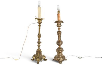 two candles that are sitting on a table