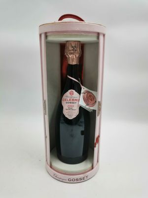 une boîte ouverte contenant une bouteille de vin